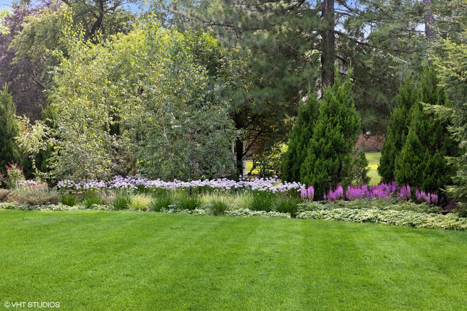 15 Longmeadow Road Winnetka, IL 60093 - Photo 61 of 71 a view of a garden with flowers and trees