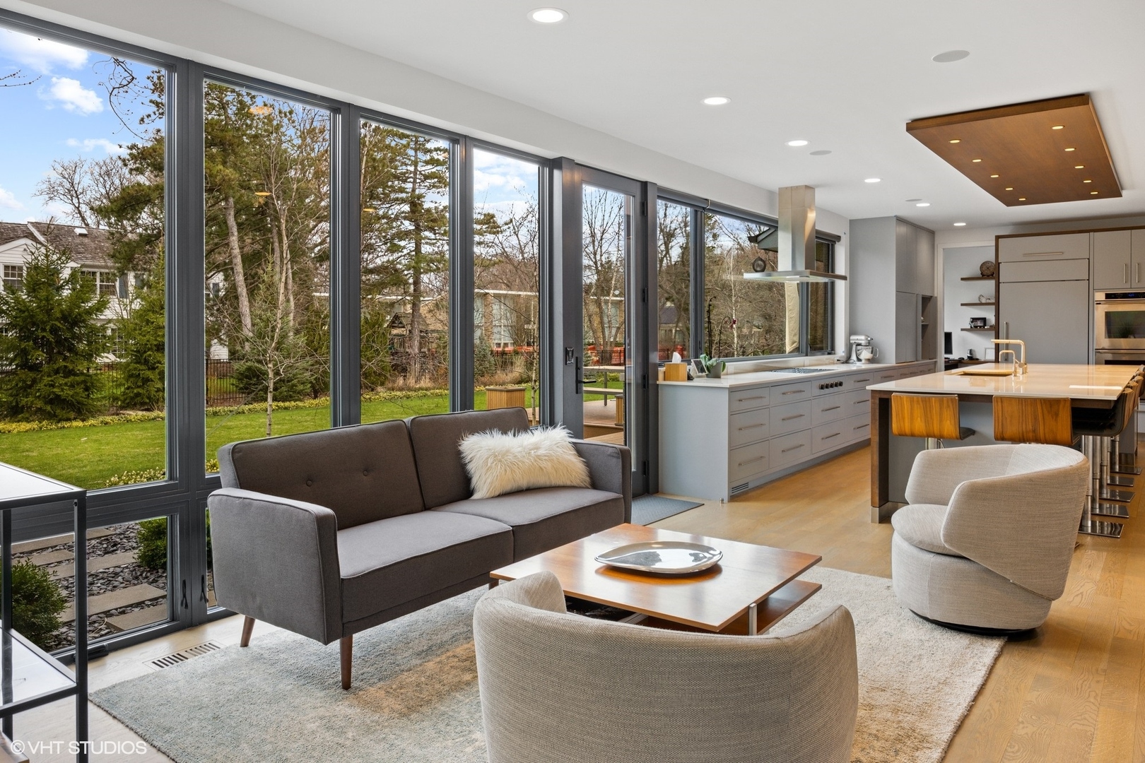 15 Longmeadow Road Winnetka, IL 60093 - Photo 10 of 71 a living room with furniture and a large window