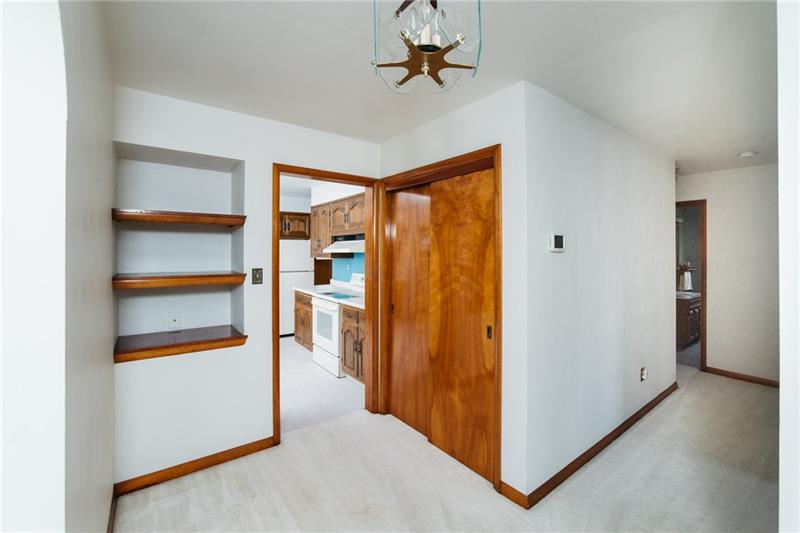 2011 Highway 130 Pleasant Unity, PA 15676 - Photo 8 of 25 13 x 16 Entry with coat closet and built-in book shelves.