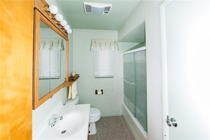 2011 Highway 130 Pleasant Unity, PA 15676 - Photo 9 of 25 Main floor bathroom with linen closet.
