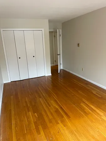 a view of room and wooden floor