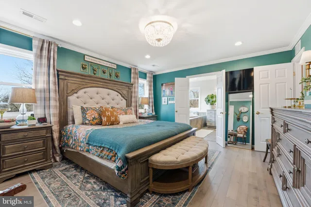 a view of a backyard with couches and fire pit