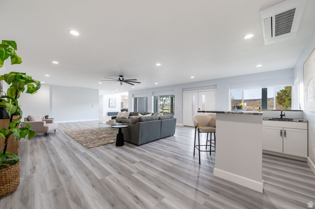 476 Spring Drive Toquerville, UT 84774 - Photo 24 of 95 Living room featuring recessed lighting, a ceiling fan, and light wood-type flooring