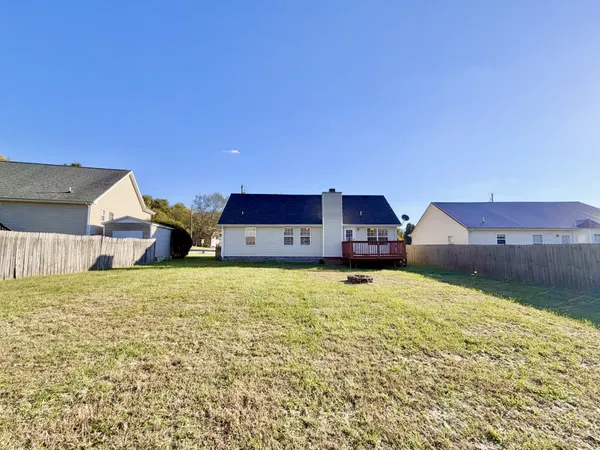 a house view with a garden space