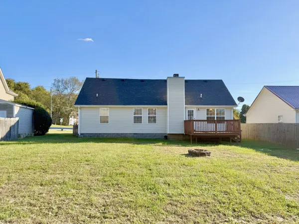 a view of a house with swimming pool