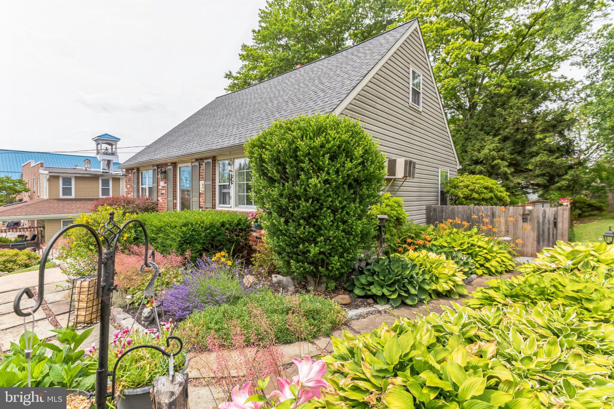 513 Spring Street Royersford, PA 19468 - Photo 4 of 29 Garden path to fenced in backyard