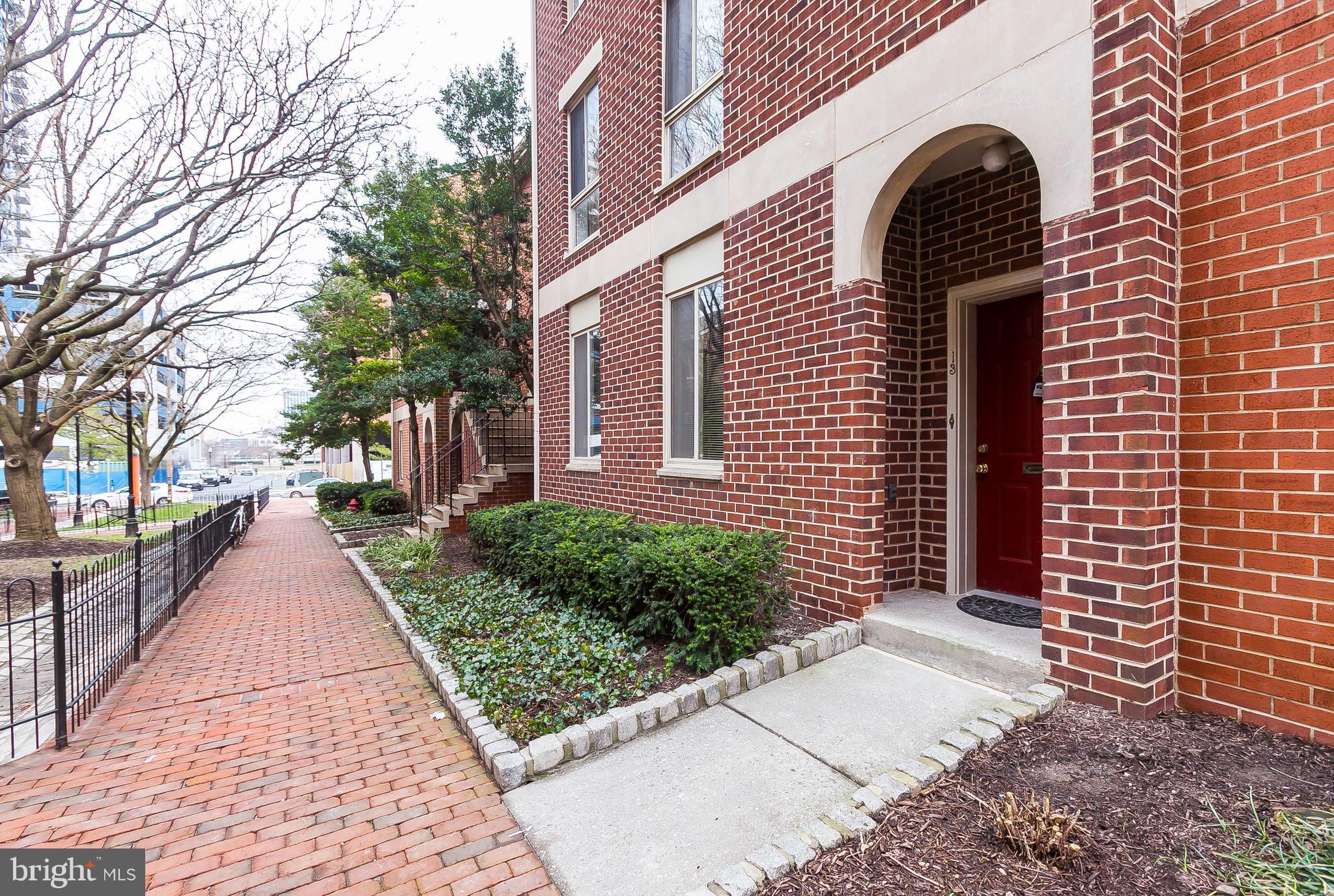 13 Andrew Place, Unit R103 Baltimore, MD 21201 - Photo 1 of 1 a front view of a house