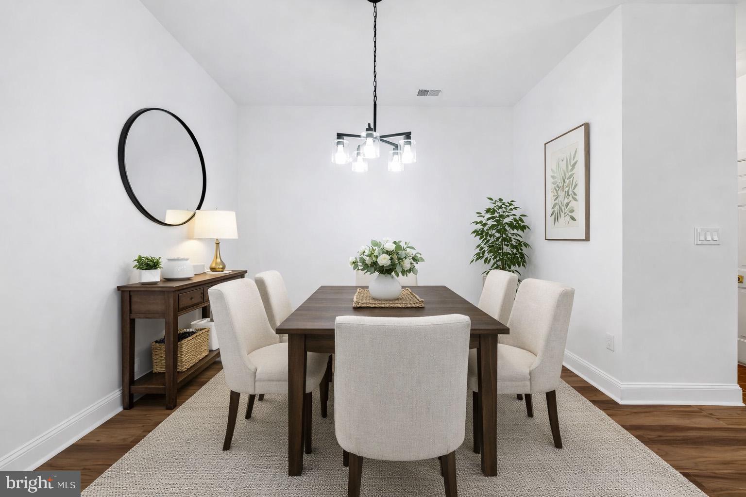13 Andrew Place, Unit R103 Baltimore, MD 21201 - Photo 11 of 38 Virtually Staged Dining Room
