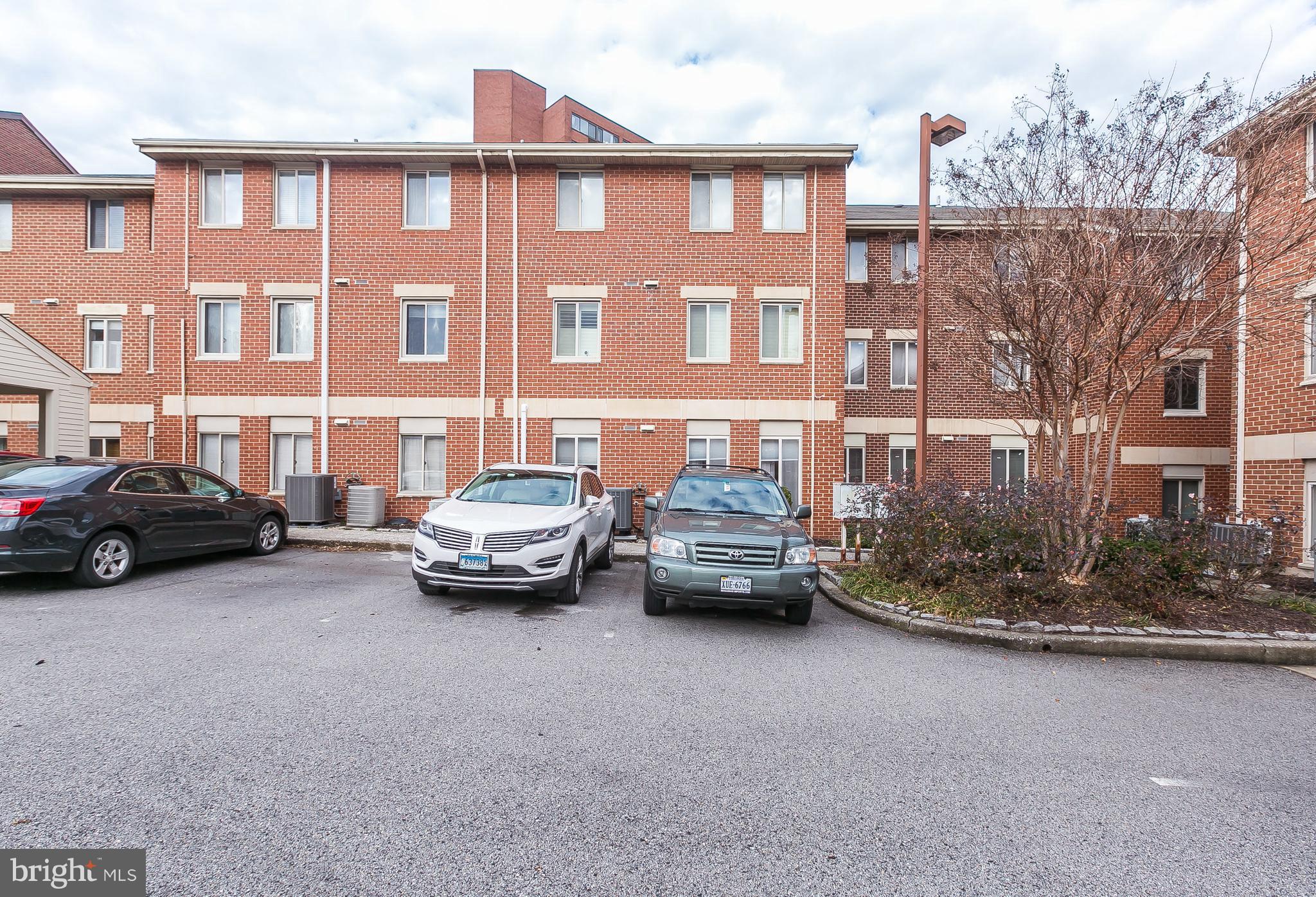13 Andrew Place, Unit R103 Baltimore, MD 21201 - Photo 31 of 38 Rents with 1 space in gated lot behind property