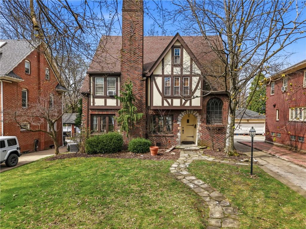 371 Case Avenue Sharon, PA 16146 - Photo 1 of 41 a front view of a house with garden