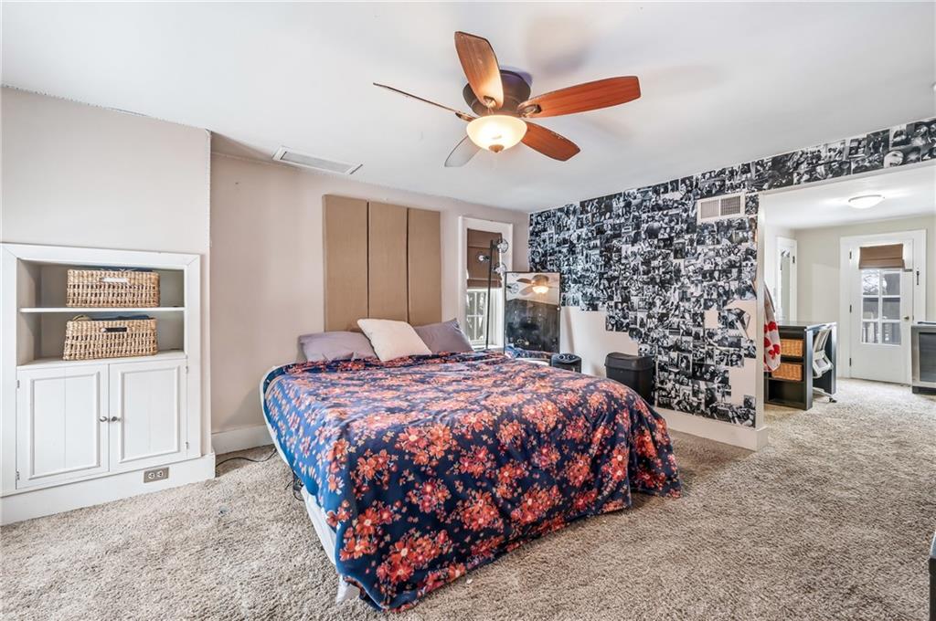 371 Case Avenue Sharon, PA 16146 - Photo 20 of 41 a bedroom with a bed and ceiling fan