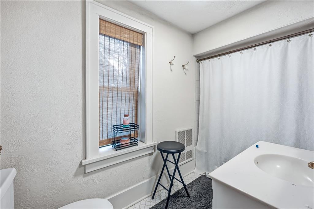 371 Case Avenue Sharon, PA 16146 - Photo 23 of 41 a bathroom with a sink and a mirror