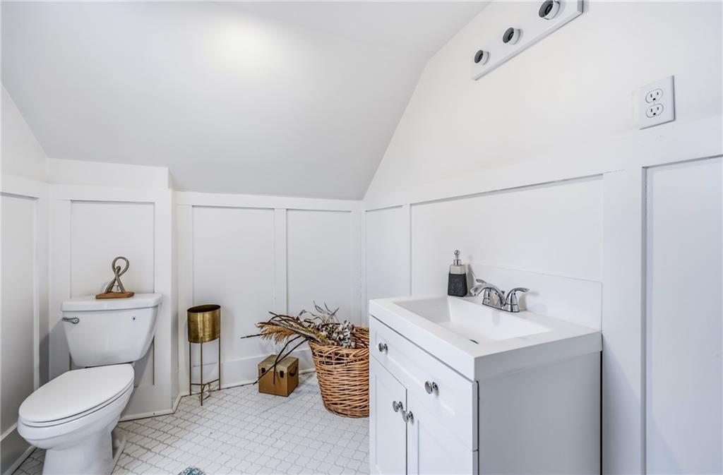 371 Case Avenue Sharon, PA 16146 - Photo 28 of 41 a bathroom with a sink a toilet and a mirror