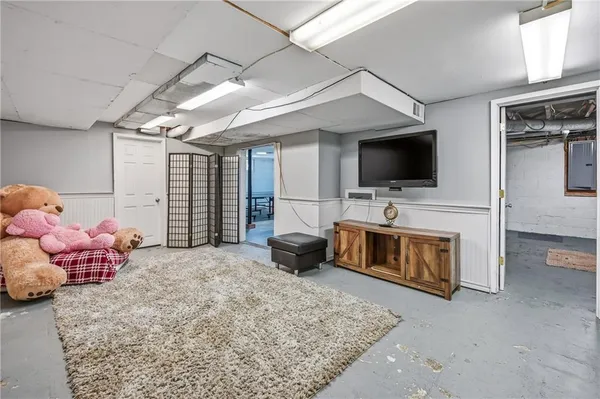 a living room with furniture and a table