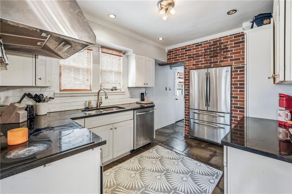 371 Case Avenue Sharon, PA 16146 - Photo 10 of 41 a kitchen with a sink appliances and cabinets