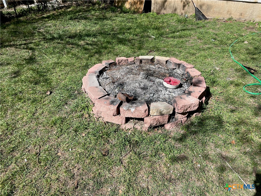 210 Carter Street Killeen, TX 76541 - Photo 11 of 11 a backyard of a house with a yard and outdoor seating