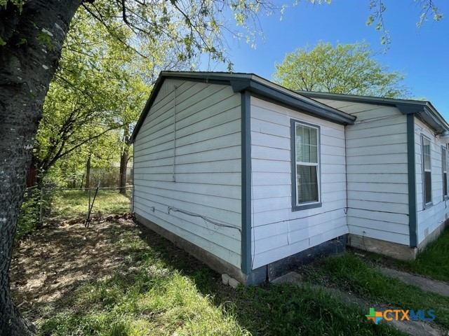 210 Carter Street Killeen, TX 76541 - Photo 4 of 11 a view of a house with a yard