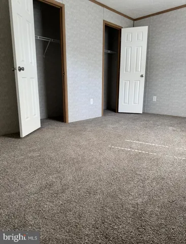 an empty room with closet