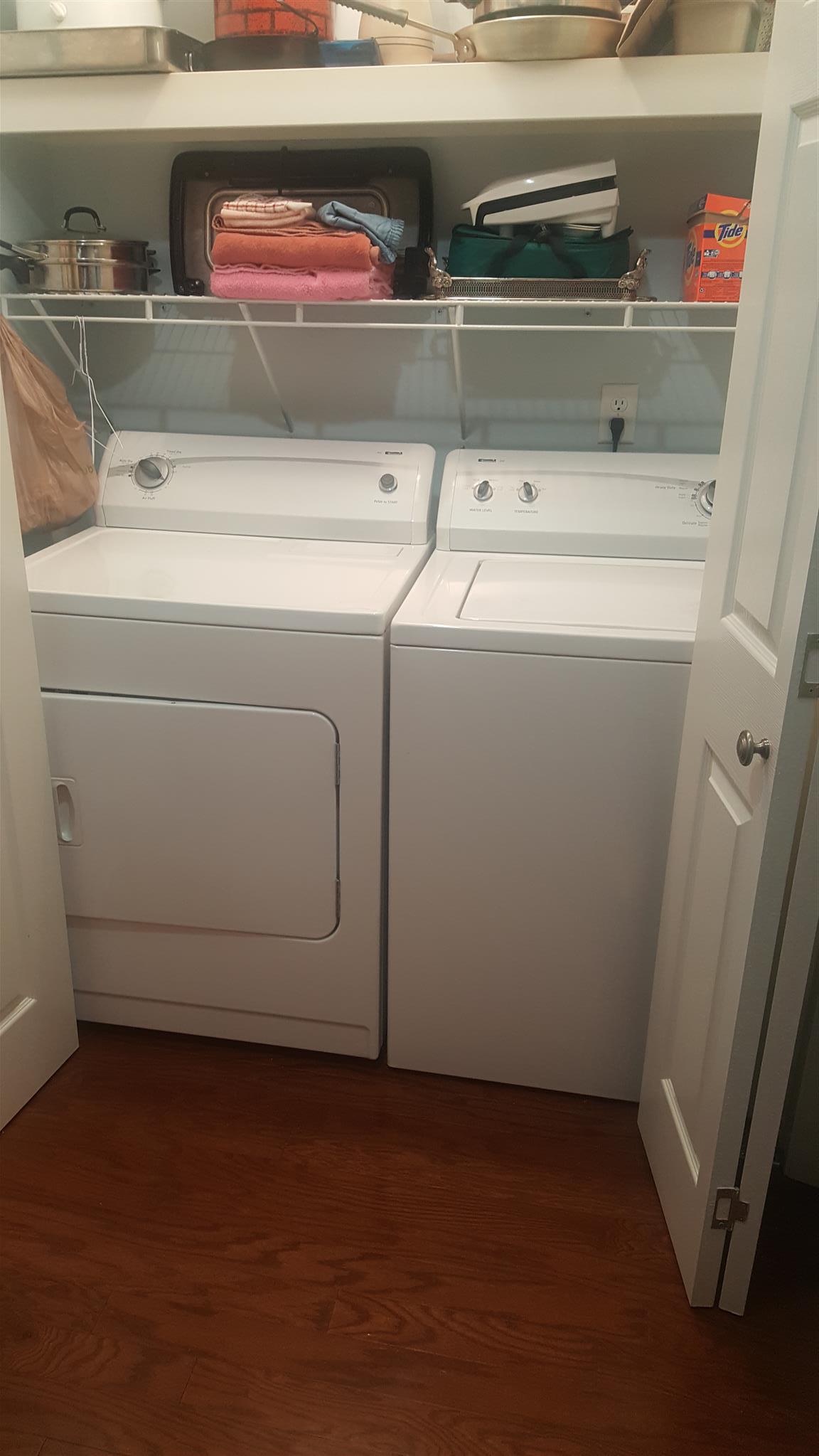 1055 General George Patton Road, Unit 1055 Nashville, TN 37221 - Photo 6 of 13 a utility room with dryer and washer