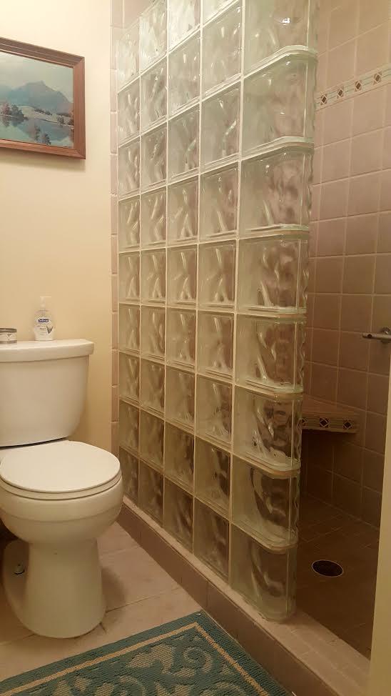 1055 General George Patton Road, Unit 1055 Nashville, TN 37221 - Photo 8 of 13 a bathroom with a toilet and a shower
