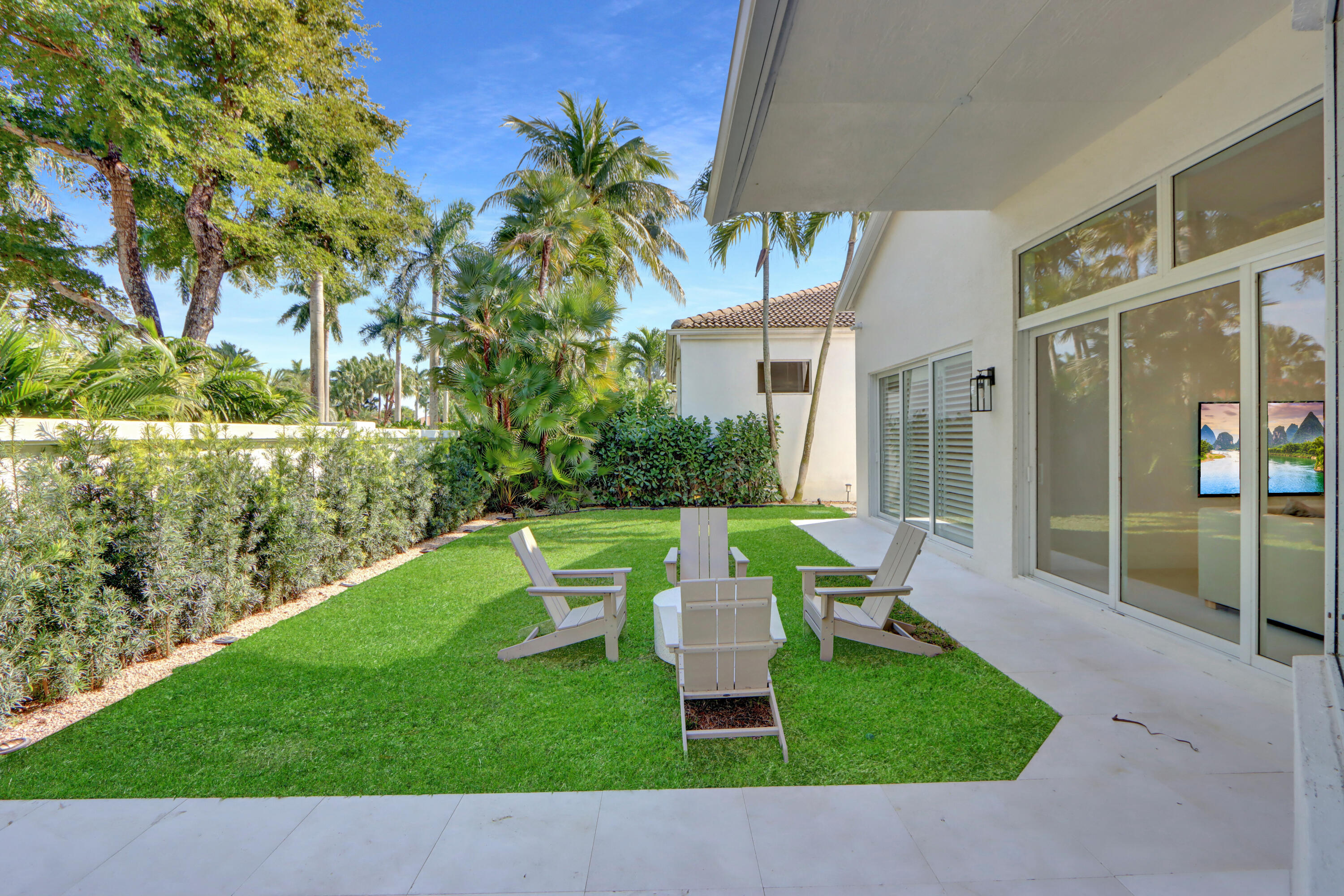 6130 Northwest 42nd Way Boca Raton, FL 33496 - Photo 22 of 43 Rear Grassy Area - 1
