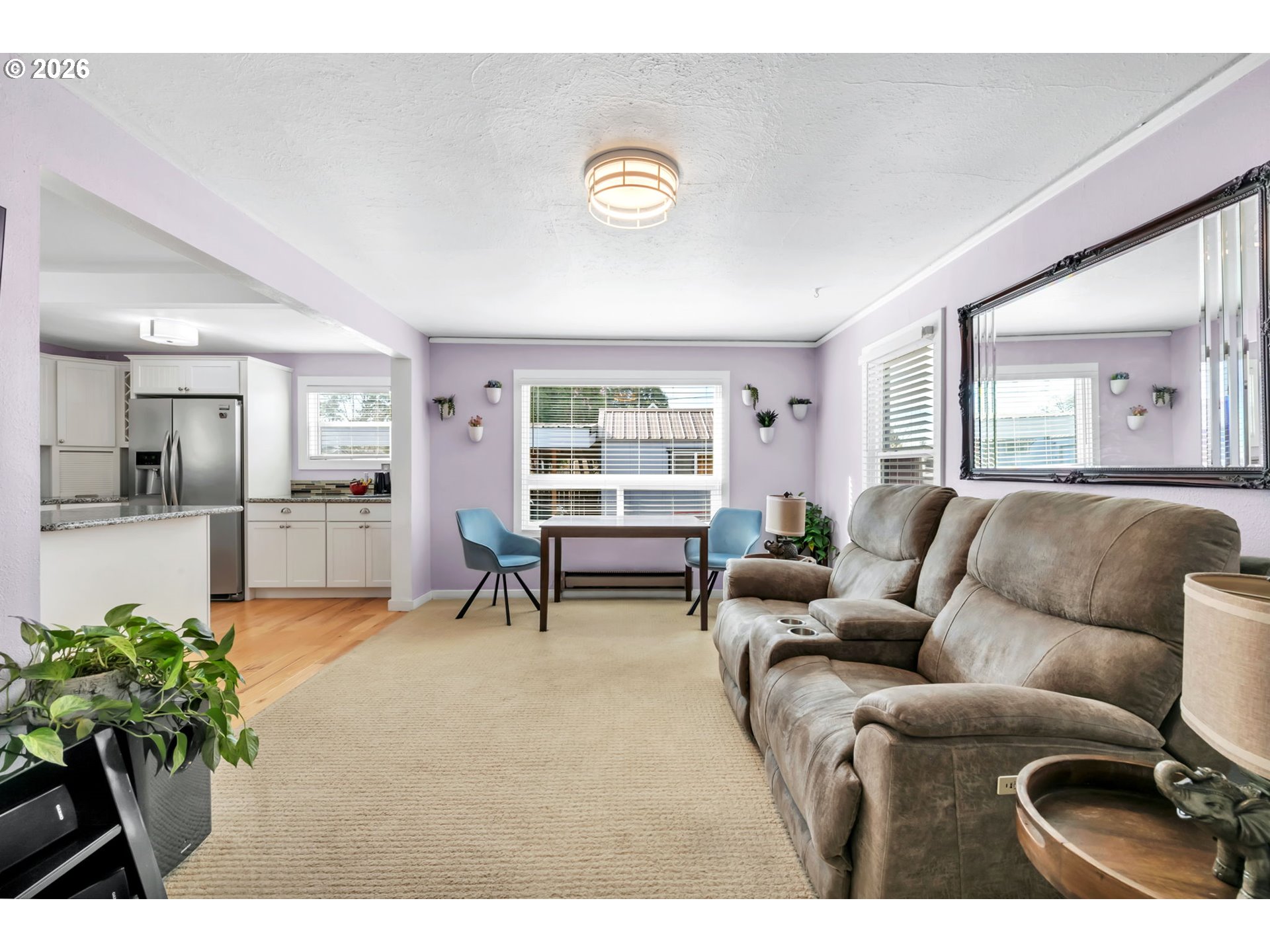 157 Hansen Lane Eugene, OR 97404 - Photo 17 of 46 a living room with furniture and a potted plant