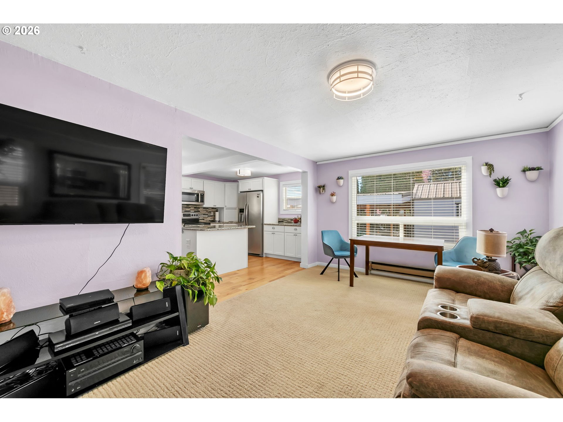 157 Hansen Lane Eugene, OR 97404 - Photo 22 of 46 a living room with furniture and a flat screen tv