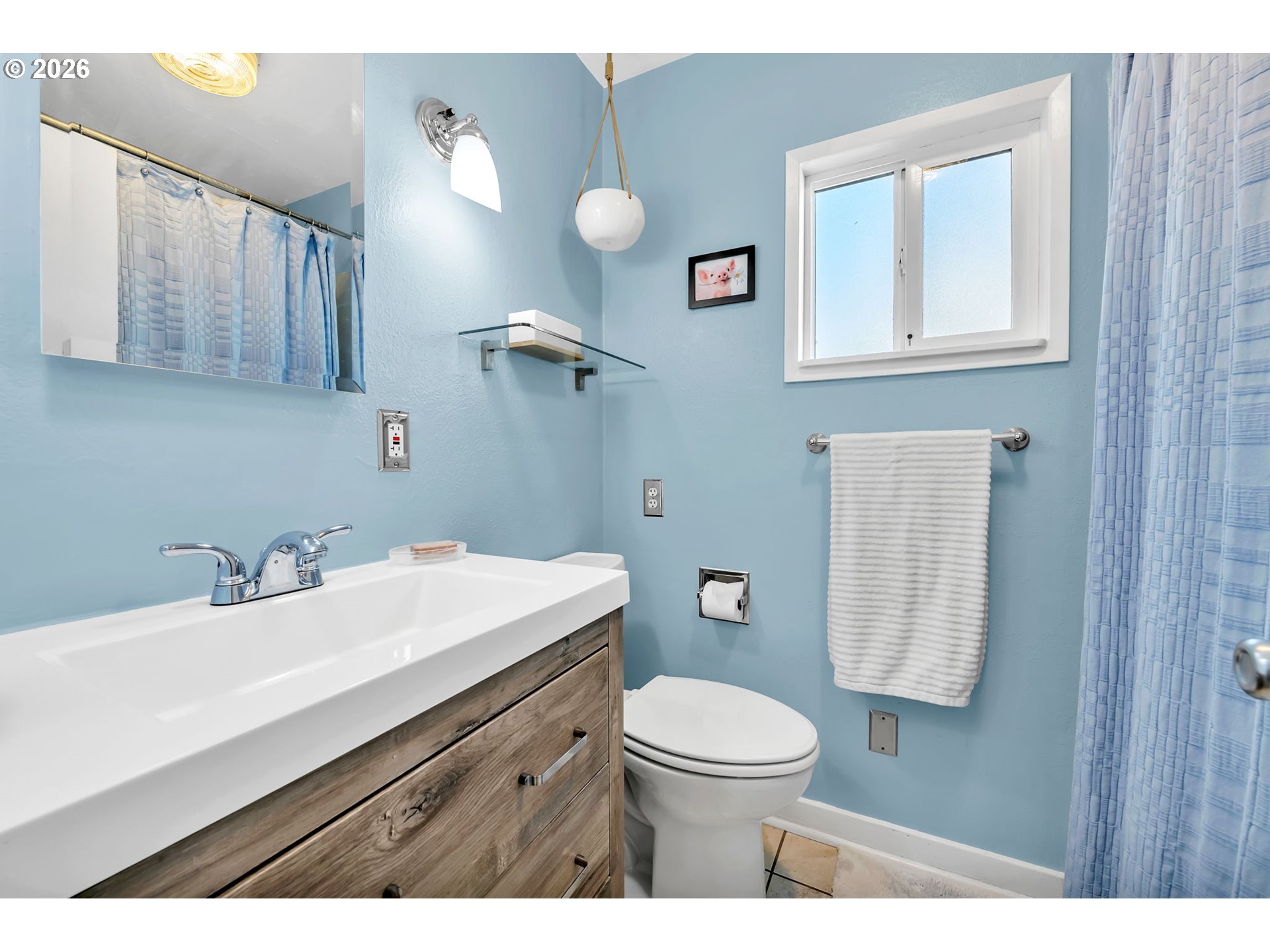 157 Hansen Lane Eugene, OR 97404 - Photo 23 of 46 a bathroom with a sink a toilet and mirror