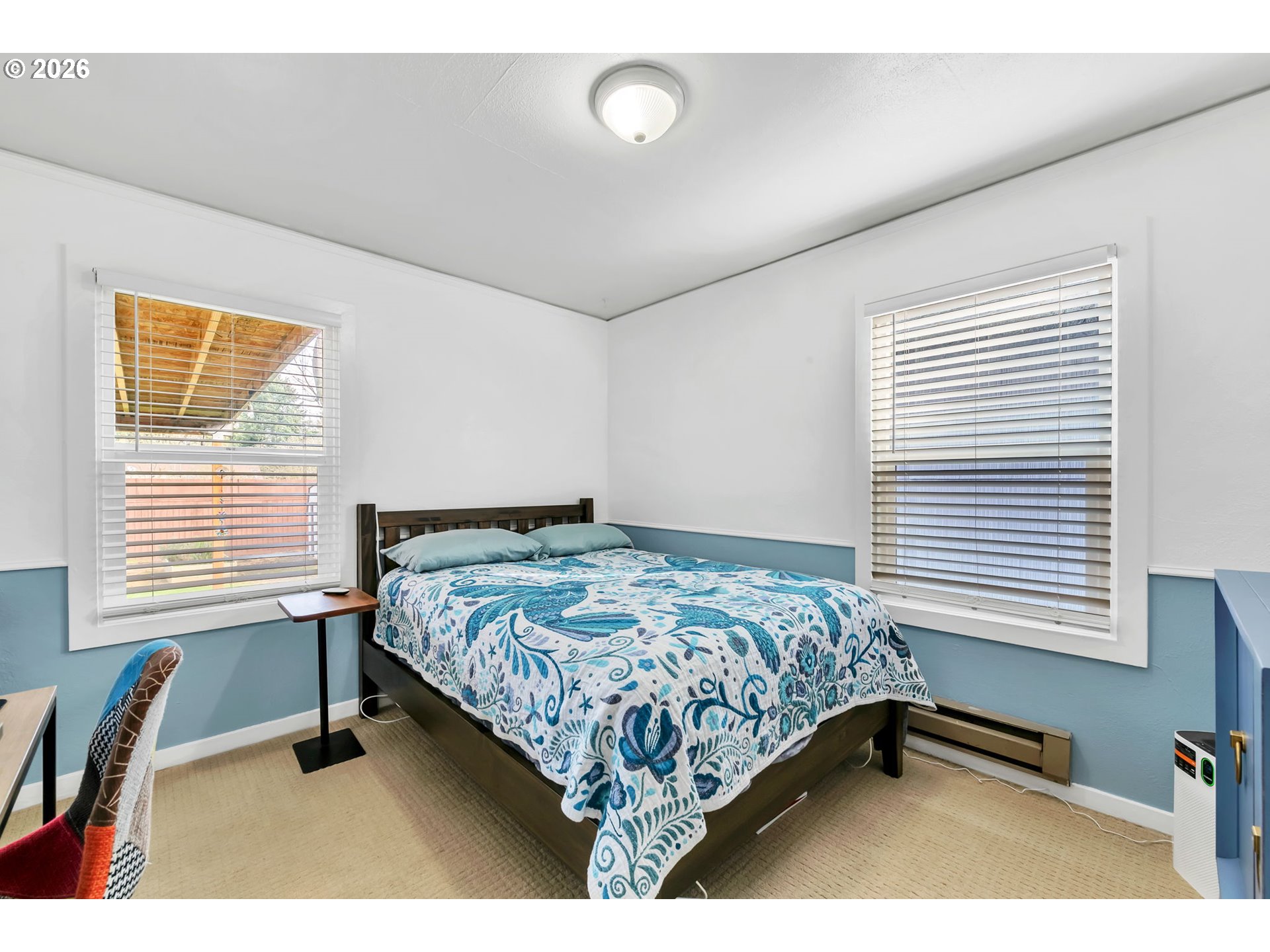 157 Hansen Lane Eugene, OR 97404 - Photo 26 of 46 a bedroom with a bed desk and a window