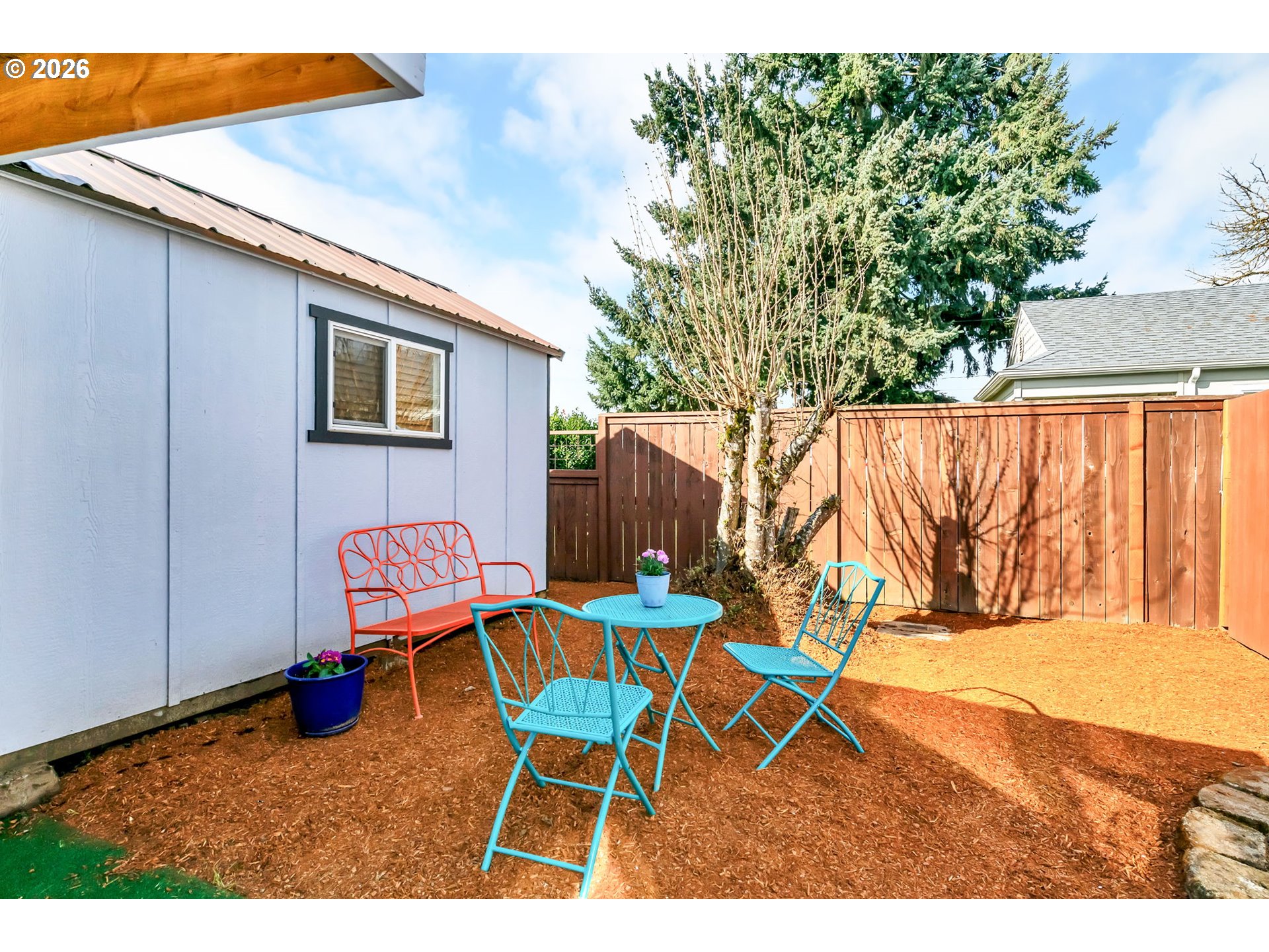 157 Hansen Lane Eugene, OR 97404 - Photo 8 of 46 a backyard of a house with table and chairs