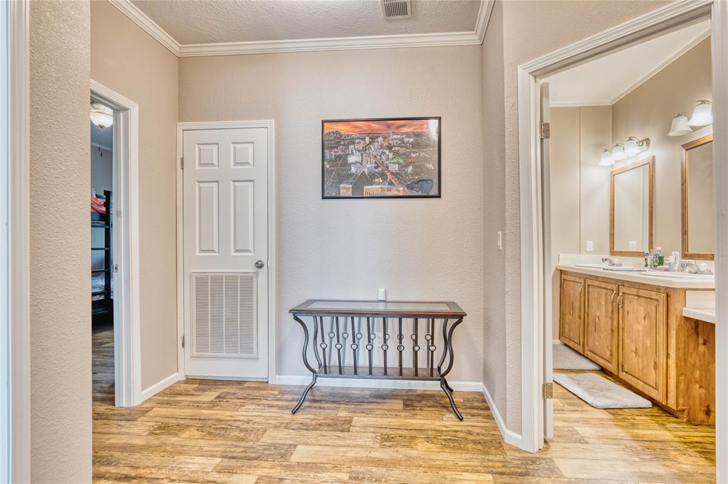 274 Northeast 106th Street Okeechobee, FL 34972 - Photo 26 of 43 a view of a bathroom with a tub and door