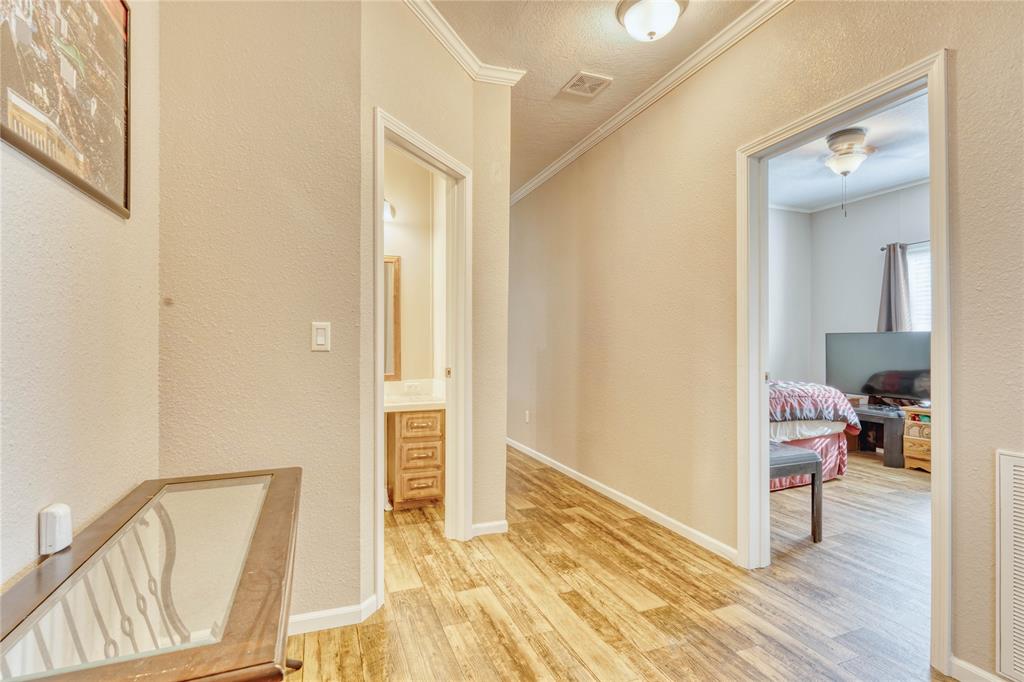 274 Northeast 106th Street Okeechobee, FL 34972 - Photo 28 of 43 a view of a hallway with wooden floor and bedroom view
