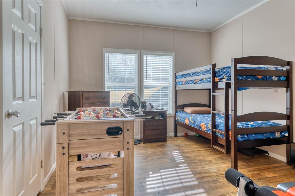 274 Northeast 106th Street Okeechobee, FL 34972 - Photo 31 of 43 a view of bedroom with furniture and a window