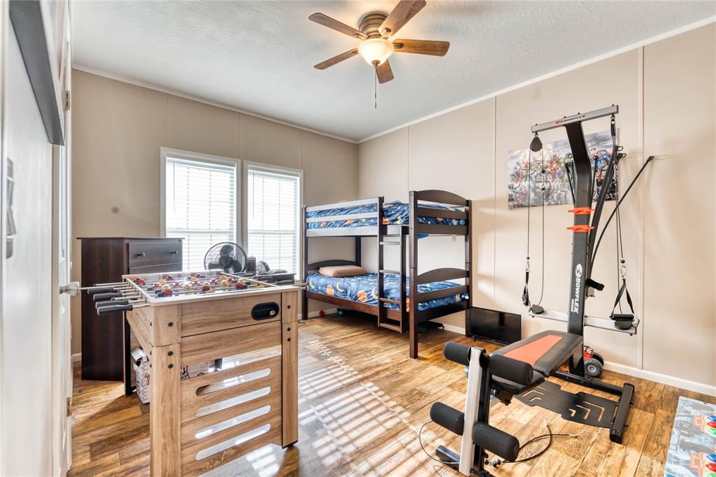 274 Northeast 106th Street Okeechobee, FL 34972 - Photo 32 of 43 a view of a workspace with furniture and a window