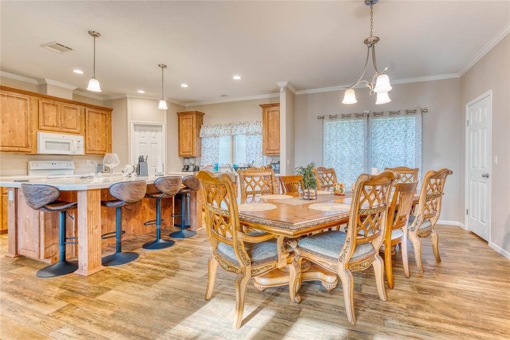 274 Northeast 106th Street Okeechobee, FL 34972 - Photo 7 of 43 a view of a dining room with furniture