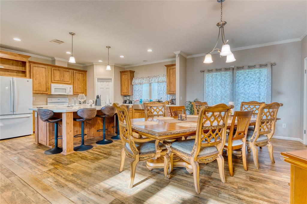 274 Northeast 106th Street Okeechobee, FL 34972 - Photo 8 of 43 a view of a dining room with furniture