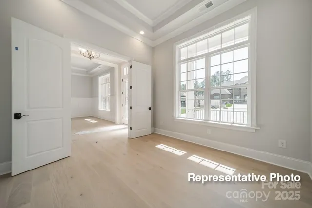 a view of an empty room and window