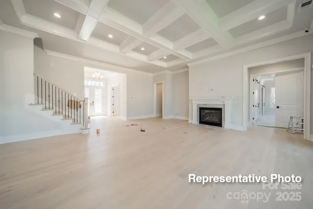 a view of a big room with kitchen granite countertop a living room