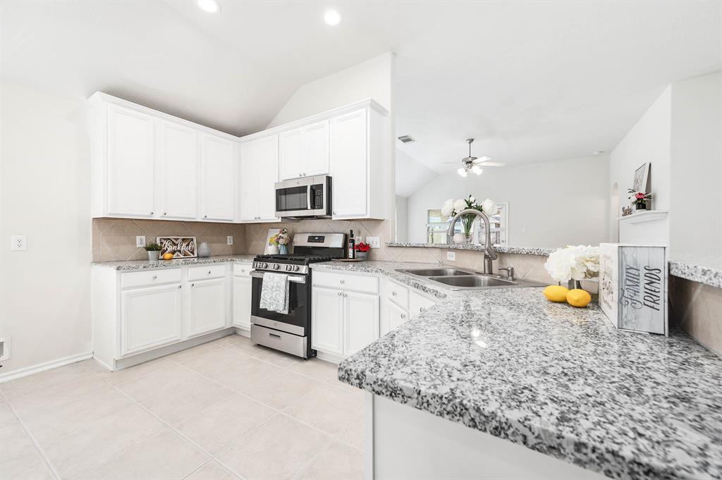 Remodel kitchen with granite counter top stainless steel appliances and updated fixture