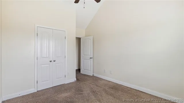 a bathroom with a double vanity sink and a large mirror