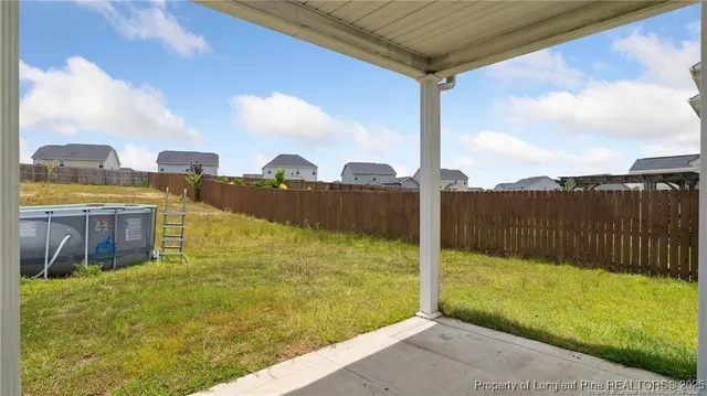 a view of a lake with a big yard