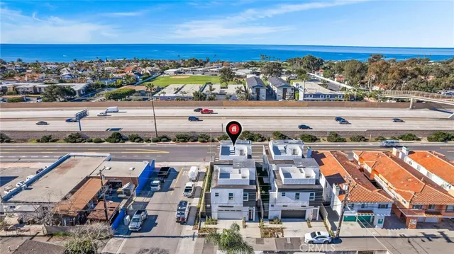 an aerial view of a city with lots of residential buildings