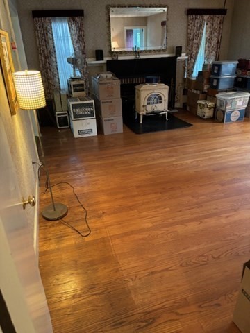 159 Florence Road Waltham, MA 02453 - Photo 11 of 12 a living room with furniture and a fireplace