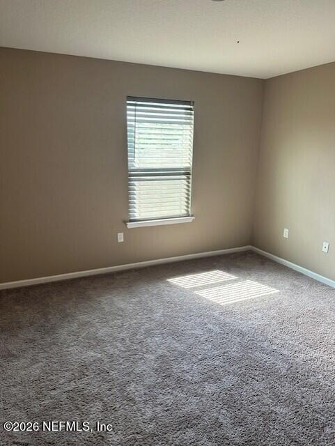 9670 Freefall Road Jacksonville, FL 32221 - Photo 23 of 31 an empty room with a window
