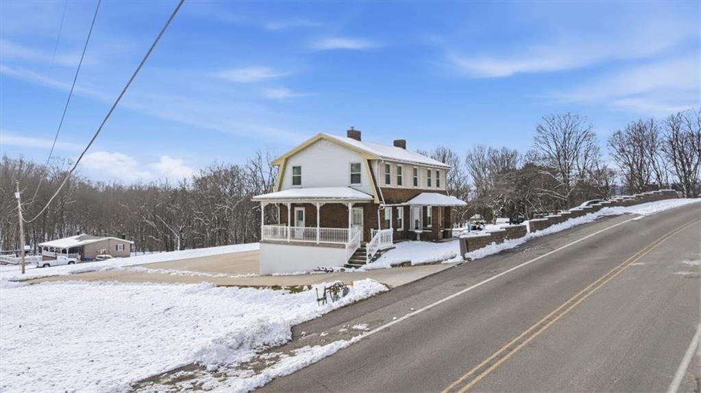 1060 Phillips Street Baden, PA 15005 - Photo 2 of 34 a front view of a house with a yard