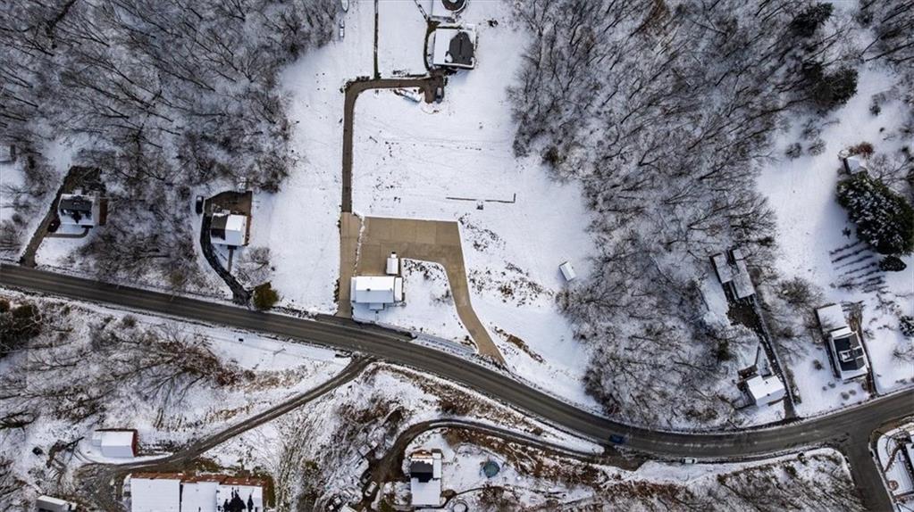 1060 Phillips Street Baden, PA 15005 - Photo 31 of 34 a bed sitting in a room next to a window
