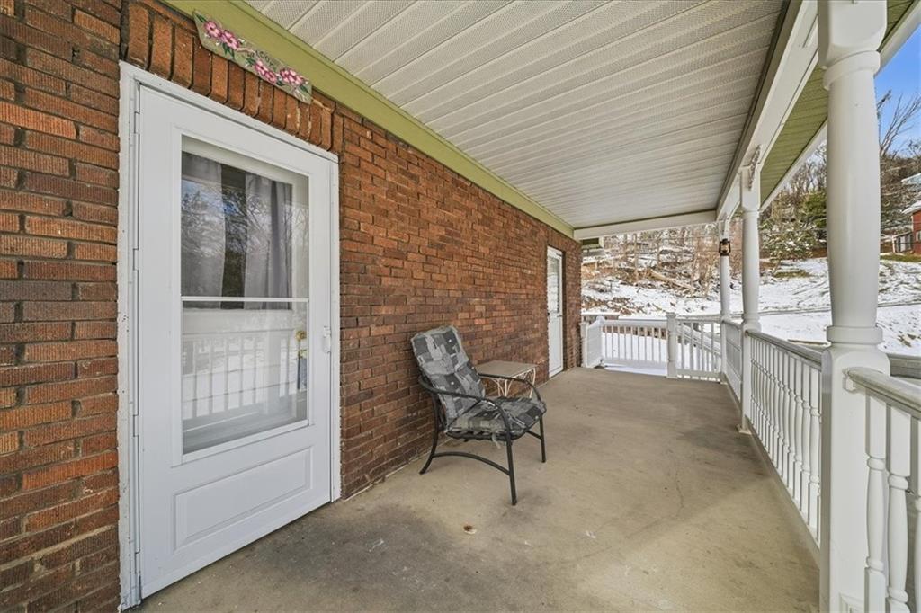 1060 Phillips Street Baden, PA 15005 - Photo 9 of 34 a view of a porch with furniture and next to a window