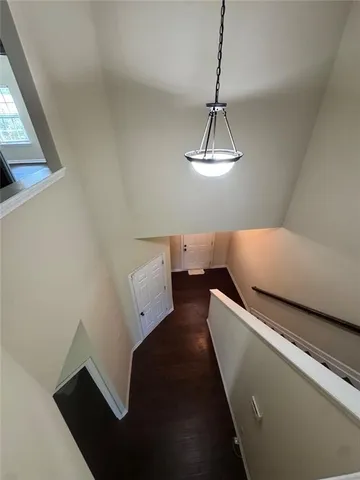 a living room with hard wood floor