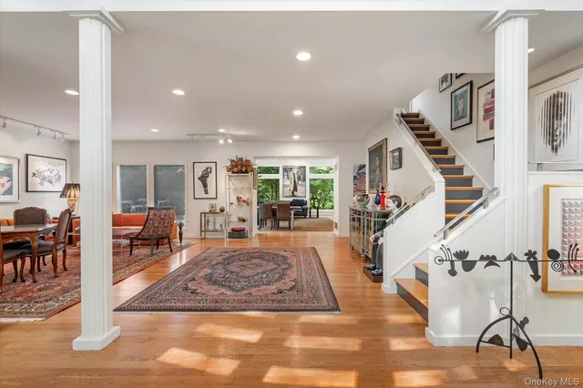 a view of living room and dining room