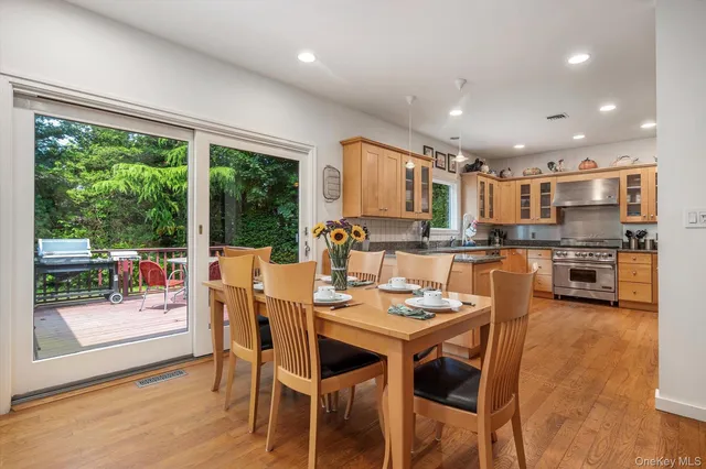 a kitchen with a table and chairs in it